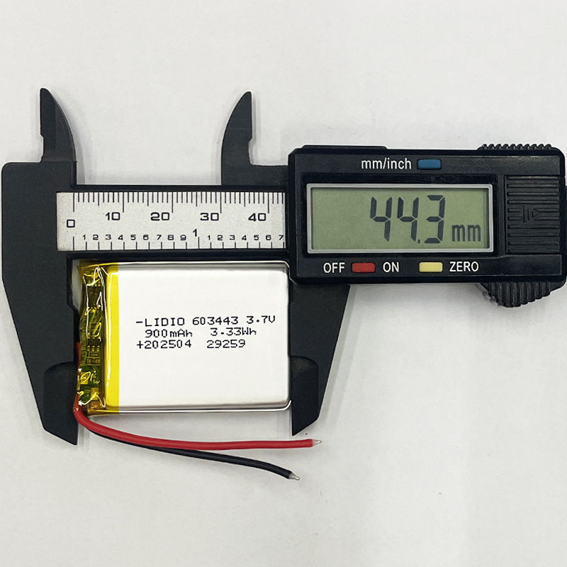 603443 battery length measurement, caliper showing 43mm, for driving recorder and beauty instrument battery size confirmation
