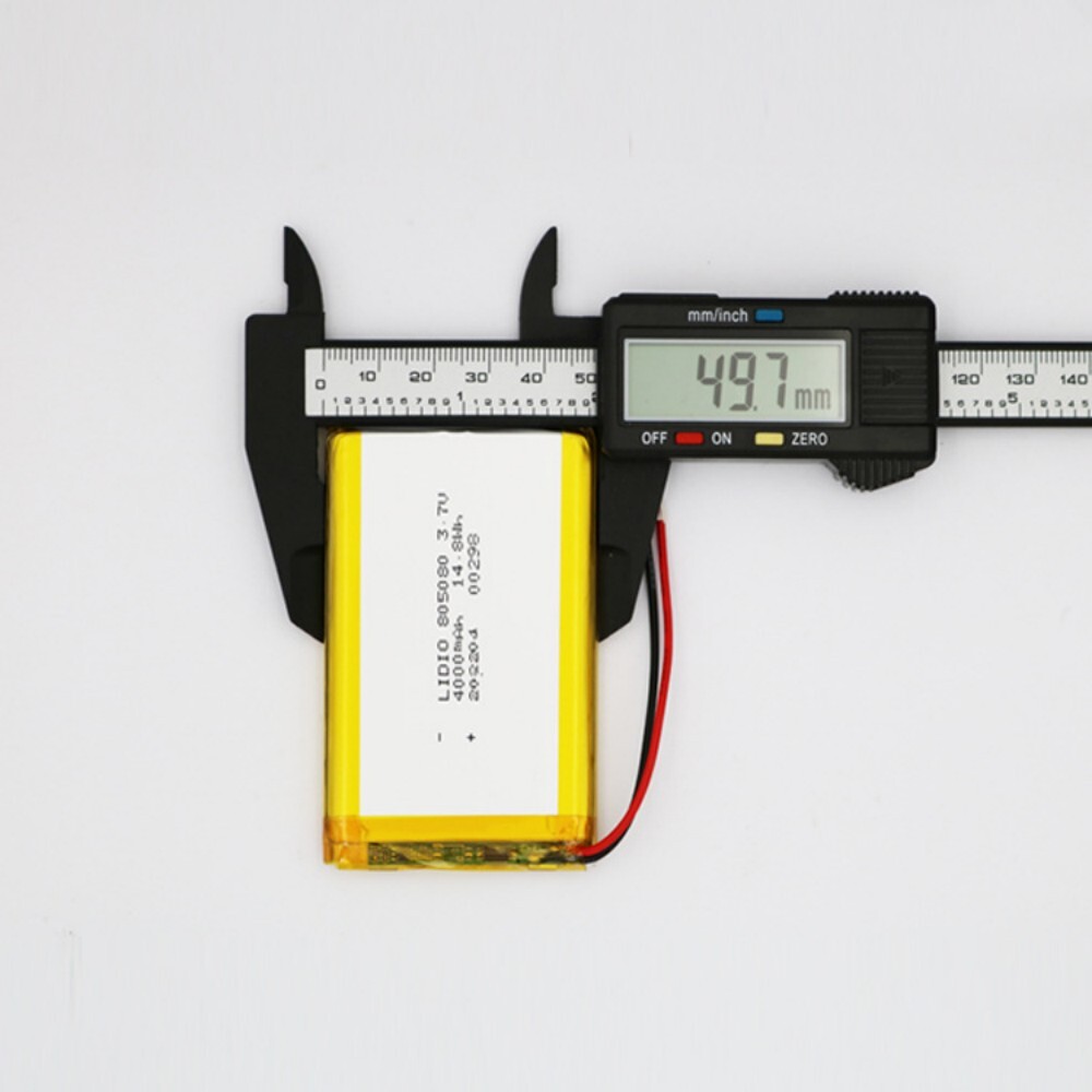 805080 battery width measurement, caliper showing 50mm, ensuring proper fit for device battery compartment